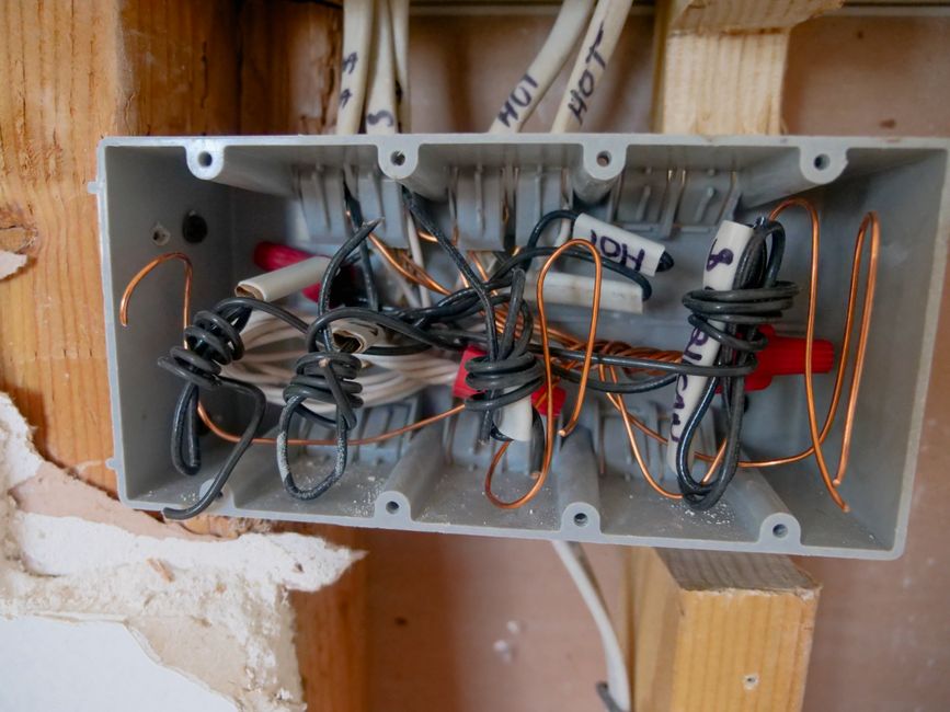 Close-up of a residential electrical panel with circuit breakers in a Boca Raton, FL home