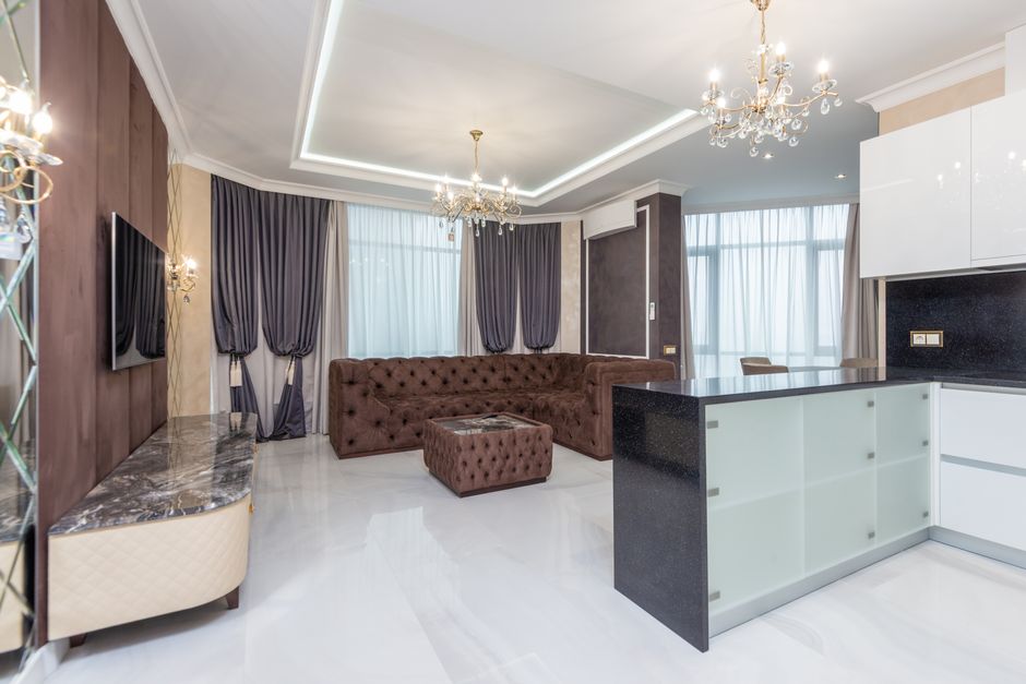 Beautiful modern living room with elegant lighting installation in a Boca Raton, FL home